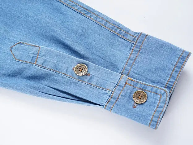 Button cuff detail on washed denim work shirt