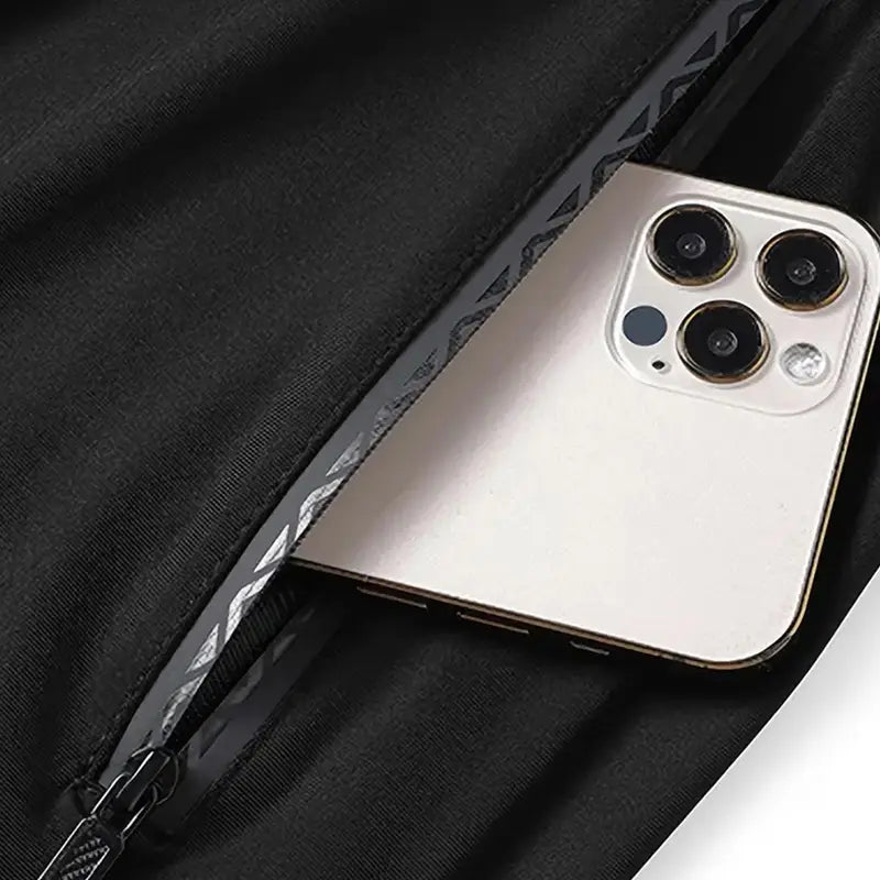 Zippered pocket detail with phone